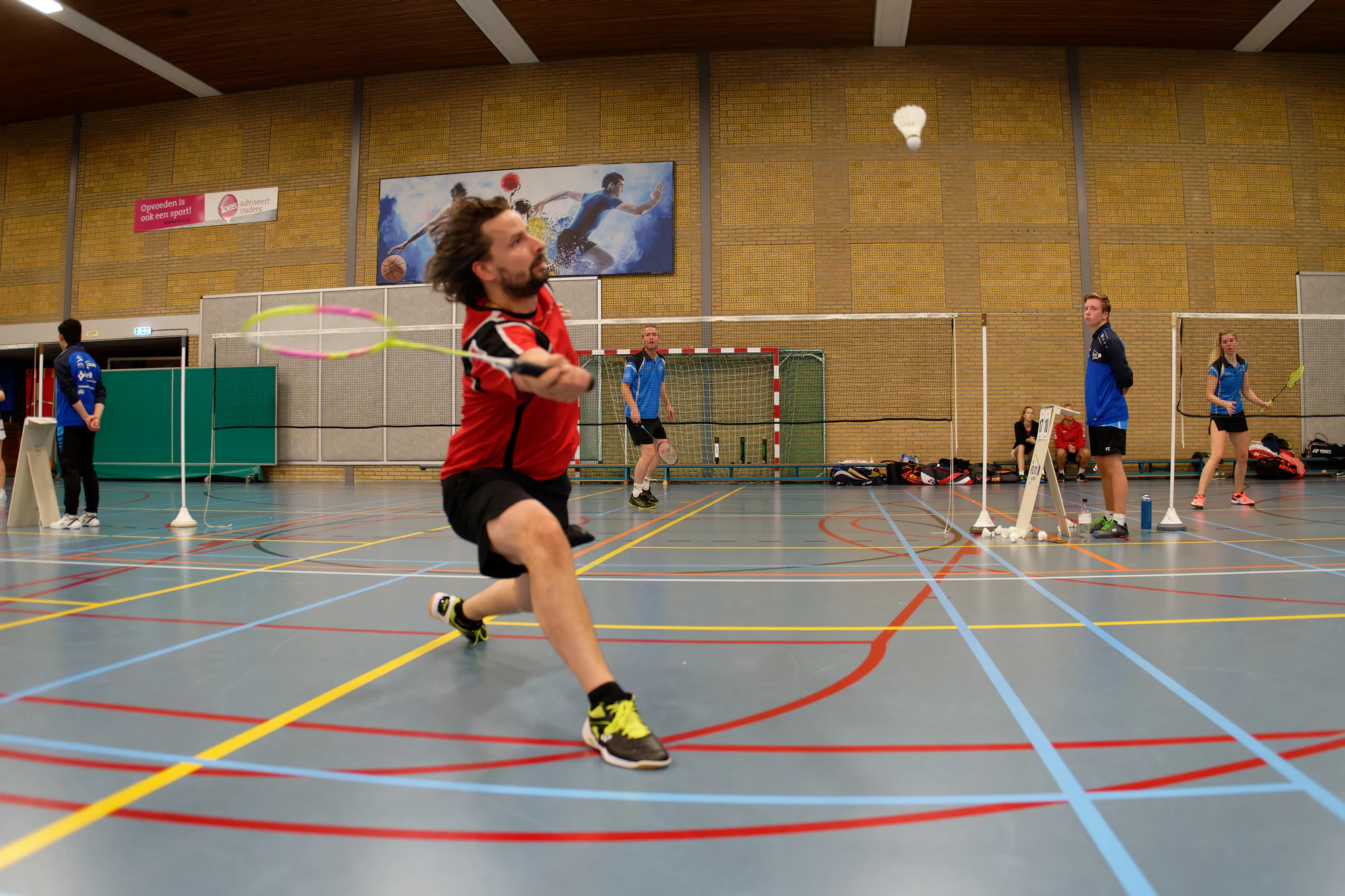 Badmintonspeler in actie